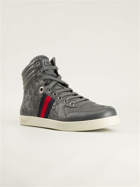 grey leather Gucci sneakers